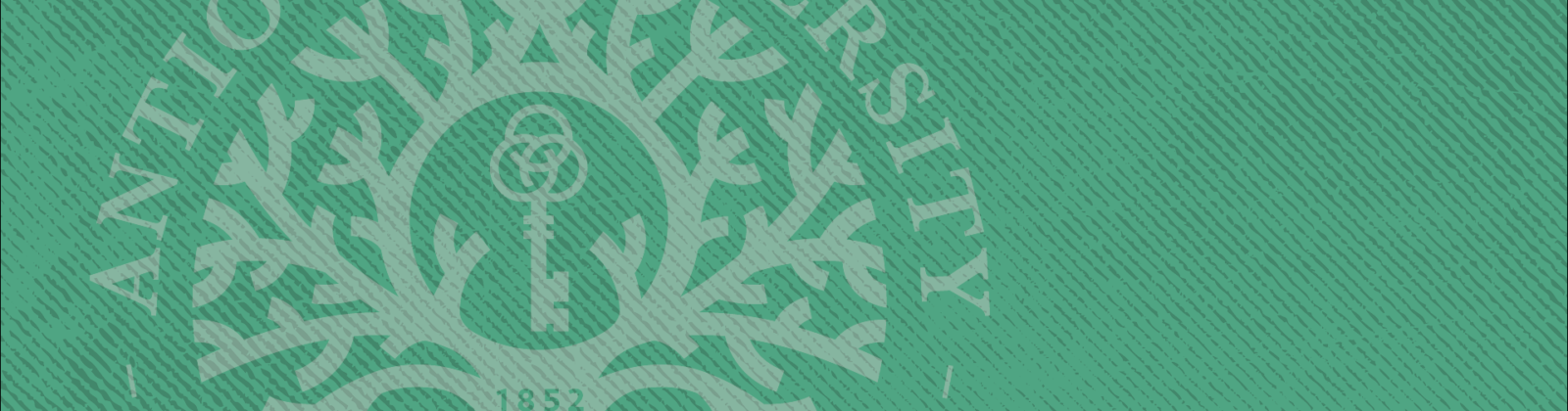 A white Antioch seal with light opacity, overlaid on a mint green textured background